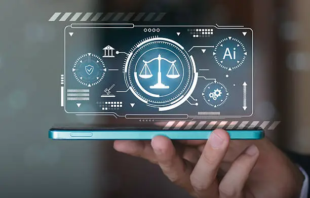 Hand holding a smartphone displaying a holographic interface with scales of justice and AI icons, representing the intersection of artificial intelligence and legal technology